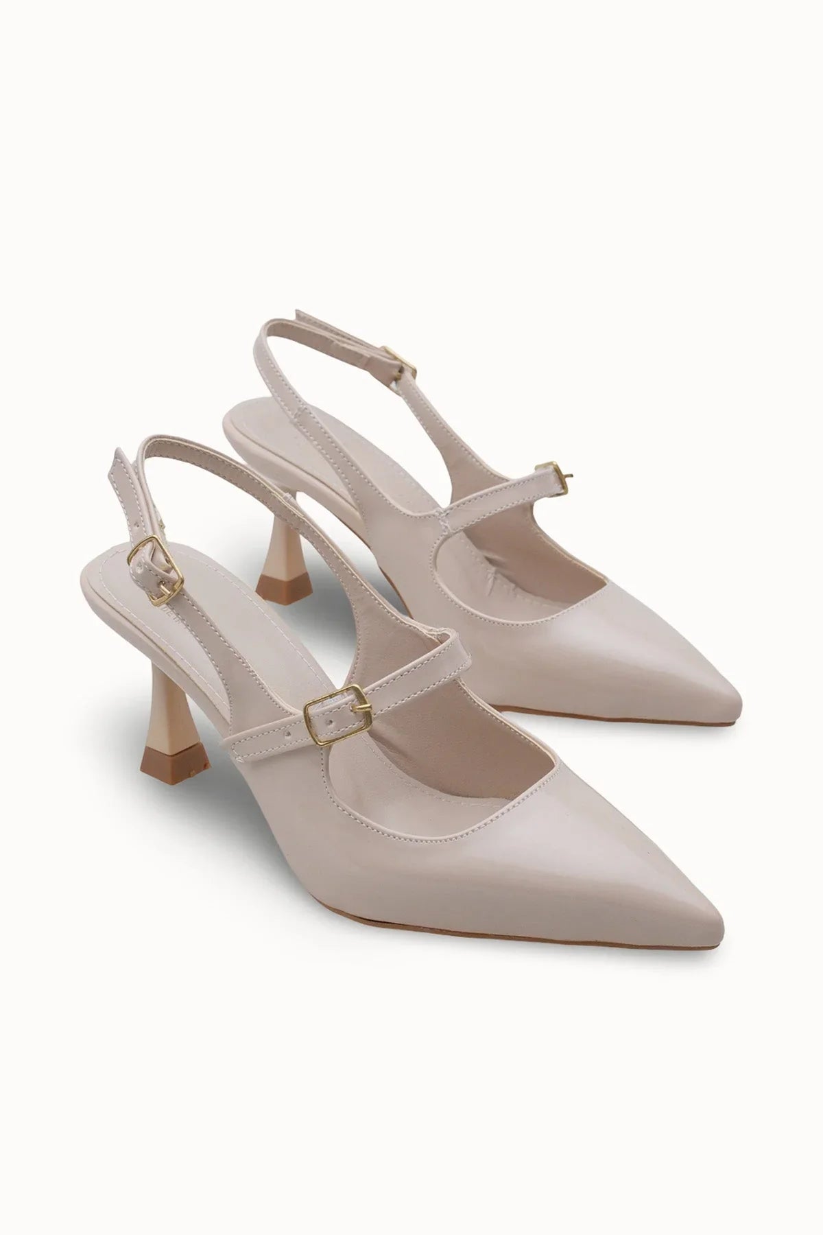 Loventino Melilendra Kadın Arkası Açık Sivri Burun Stiletto 0012701 Ten Cilt - Lüks stiletto ayakkabı, zarif tasarımıyla şıklığınızı tamamlar.