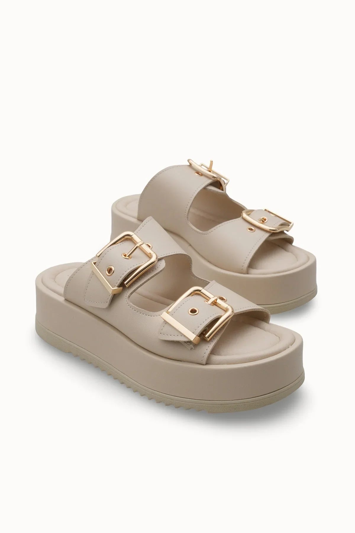 Loventino Winledha Kadın Çift Tokalı Terlik 001278 Bej Cilt - Zarif ve şık tasarımıyla, her tarza uyum sağlayan lüks kadın terliği.