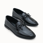 Şık detaylarıyla dikkat çeken Riccon Loventino Kadın Babet 001295 - Siyah Cilt, şıklığı yansıtan rahat bir ayakkabı.