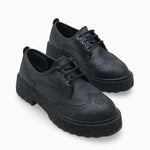 Riccon Loventino Oknyrth Kadın Bağcıklı Loafer 00121990 Siyah Cilt şıklığı ile dikkat çeken kadın ayakkabı.