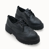 Riccon Loventino Oknyrth Kadın Bağcıklı Loafer 00121990 Siyah Cilt şıklığı ile dikkat çeken kadın ayakkabı.